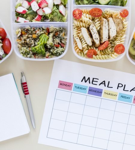 top-view-assortment-food-with-planner